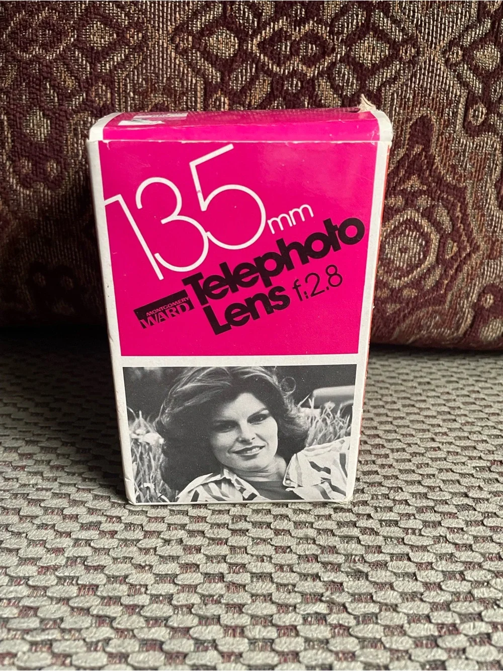 135mm f/2.8 Telephoto Lens in Pink Packaging
